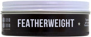 Side image: Uppercut Deluxe Featherweight Fiber Paste 70g jar firm hold styling paste packaging