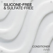 Redken Acidic Bonding Curls Conditioner showing ingredients and formulations.