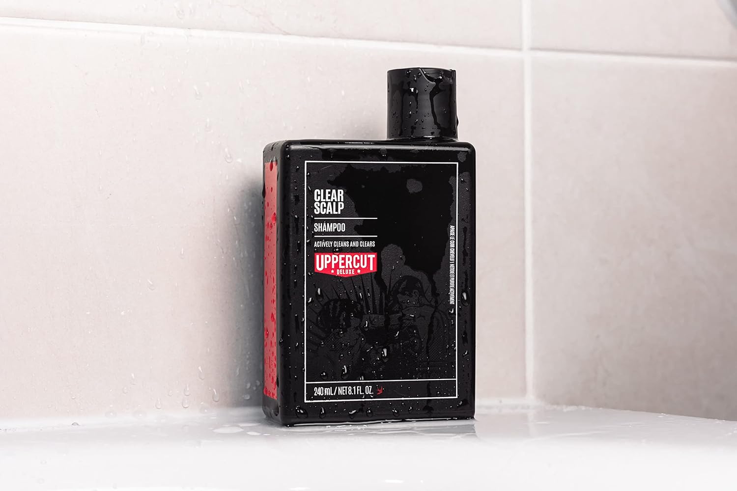 Lifestyle/use image: Uppercut Deluxe Clear Scalp Shampoo 240ml men hair care routine