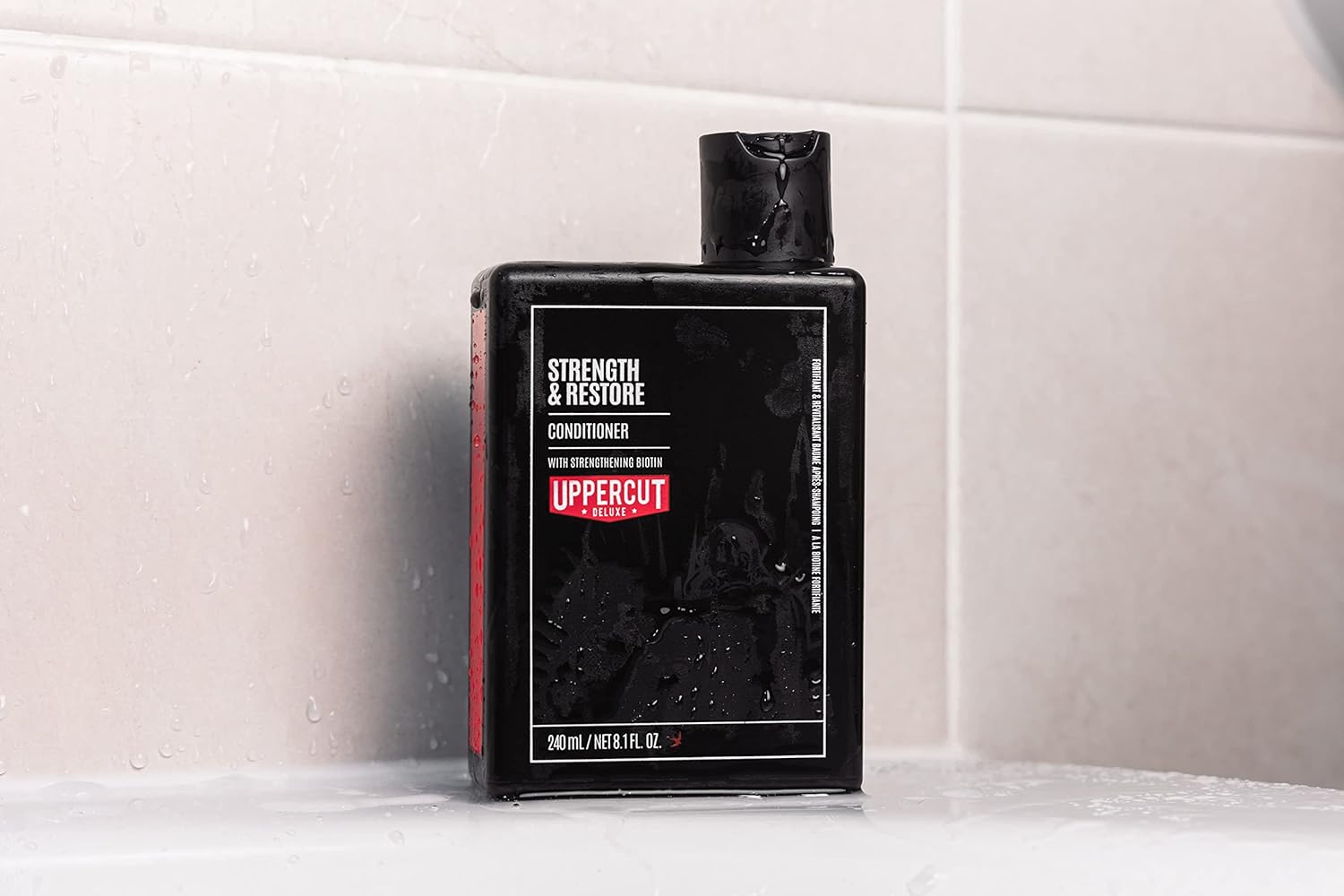 Lifestyle/use image: Uppercut Deluxe Strength and Restore Conditioner 240ml men hair care routine