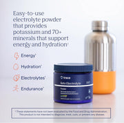 Lifestyle Image: Trace Minerals Keto Electrolyte Powder lemon lime drink preparation tub 369g