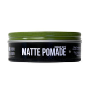 Side image: Uppercut Deluxe Matte Pomade 100g tin medium hold matte styling product packaging