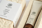 Re[Sens] skincare product with packaging on a textured surface